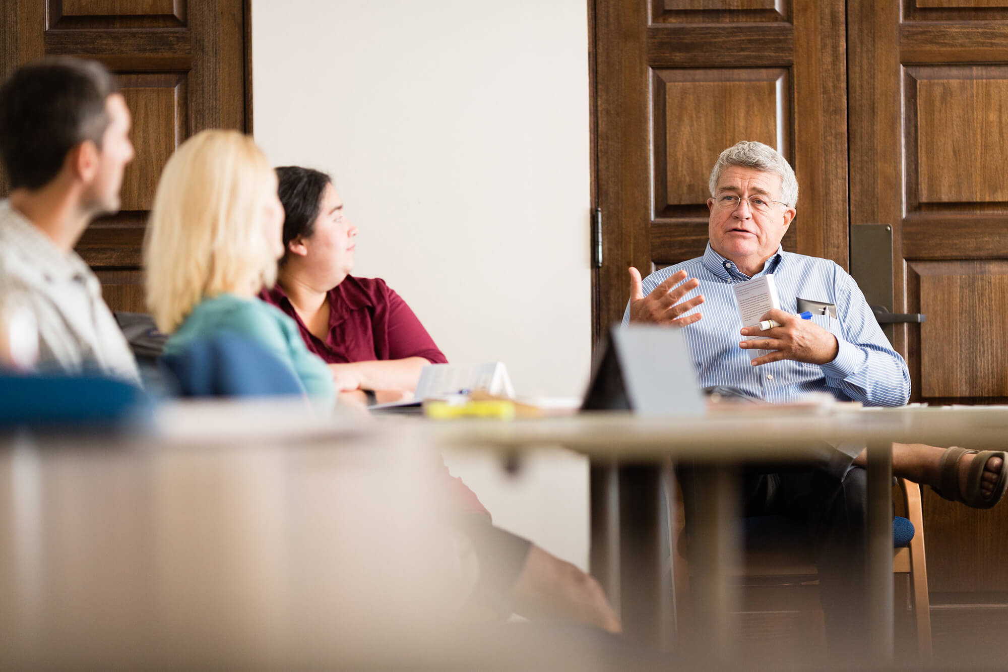 A professor leads a class discussion at Rollins College.